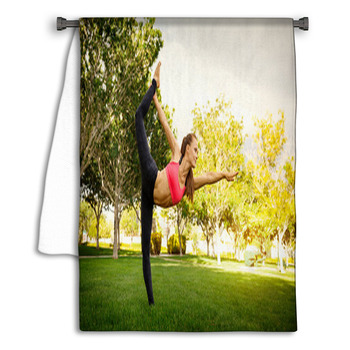 Pretty Woman Doing Yoga Exercises In The Park Towel