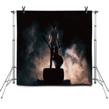 Rock Musician And Large Guitar A Lot Of  Fleece Backdrop