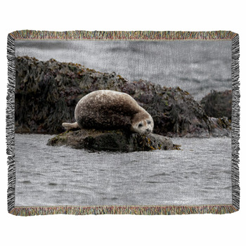 Seal Relaxing On A Rock In  Iceland Woven Throw Blanket
