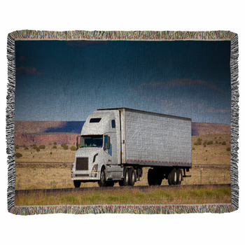 Semi-truck On The Road In The Desert Woven Throw Blanket