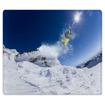 Skier In High Mountains Area Rug