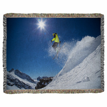 Skier In High Mountains Woven Throw Blanket