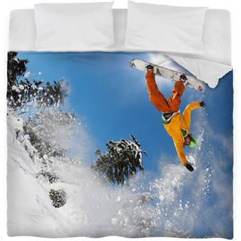 Snowboarder Jumping Against Blue Sky Fleece Bed Blanket
