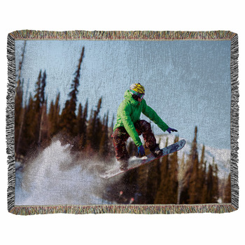 Snowboarder Jumping Woven Throw Blanket