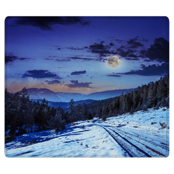 Snowy Road To Coniferous Forest In Mountains At  Bath Mat