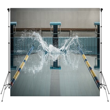 Splashes After Swimmers Jump In A Fleece Backdrop