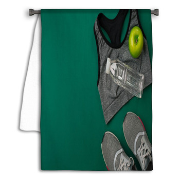 Sports Accessories For Fitness On The Green Floor Towel