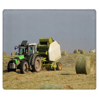Tractor Collecting Haystack In The Field Bath Mat
