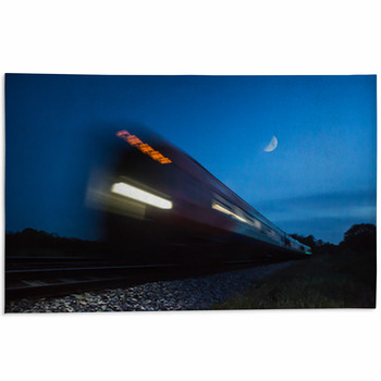 Train Speeding Passed In Blur At Night Area Rug