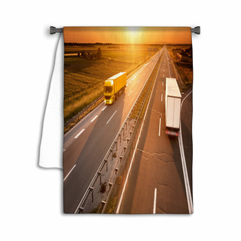 Yellow And White Truck In Motion Blur On The Towel