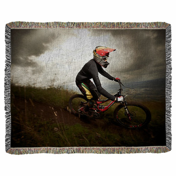 Young Man Riding A Mountain Bike Woven Throw Blanket