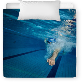 Young Man Swimming In Pool Toddler Duvet