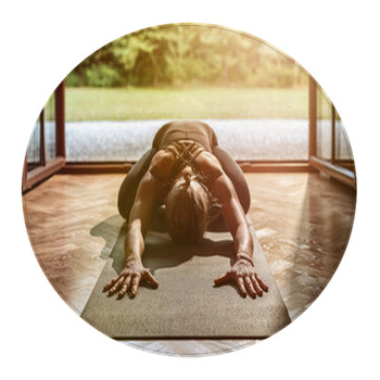 Young Woman Practicing Yoga At Home Round Rug